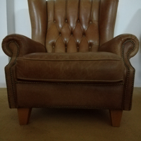 Poltrona Bergere in pelle lavorazione capitonne'