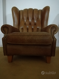 Poltrona Bergere in pelle lavorazione capitonne'