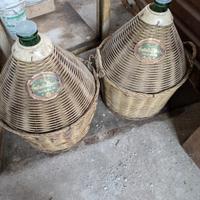 Coppia di damigiane olio Fratelli Carli