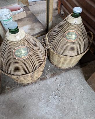 Coppia di damigiane olio Fratelli Carli