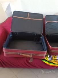 trittico di valigie