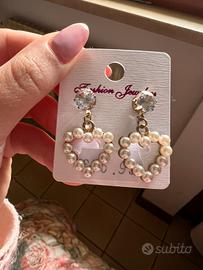 Orecchini pendenti con cuori