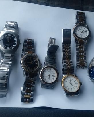 sette orologi come da foto 