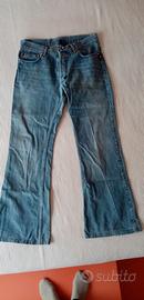 Jeans uomo a zampa con borchie taglia L