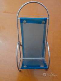 Poggia cellulare, appendino, torcia, sopramobili.