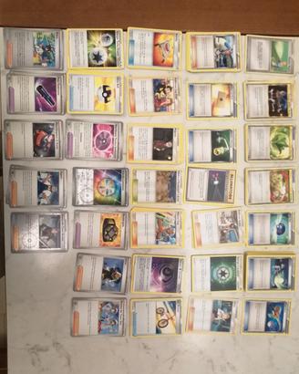 Lotto 157 carte Pokemon allenatori 