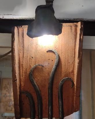 coppo e tegola con luci da parete