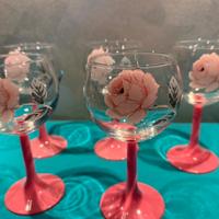 Bicchieri e piatti rose