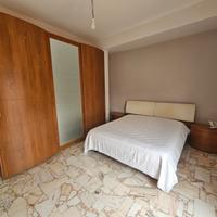 Camera da letto in legno completa