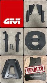 Vari adattatori GIVI per bauletti moto e scooter