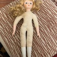 Bambola antica ceramica