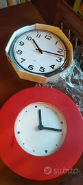 2 orologi da parete e 1 da polso