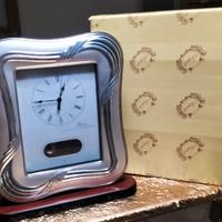 Cornice argento 925 con orologio a pendolo 