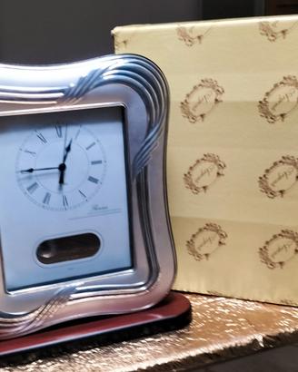 Cornice argento 925 con orologio a pendolo 