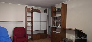 SOGGIORNO DA DUE PARETI CON TAVOLO ALLUNGABILE