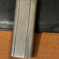 Accendino Cartier ovale argento vintage con custod