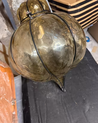 Lampadari artigianali in vetro e ferro battuto