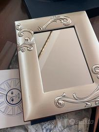 Cornice argento