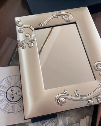 Cornice argento