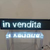 Insegna luminosa scorrevole