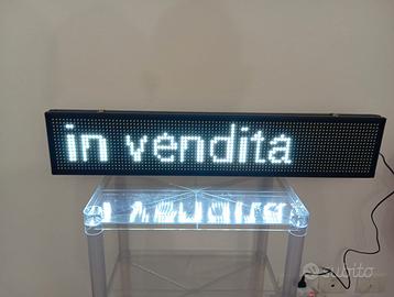 Insegna luminosa scorrevole