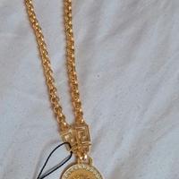 collana con testa di cristallo versace