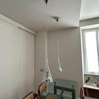 FontanaArte. Lampade flute a sospensione