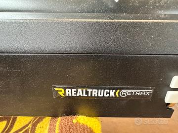 Copricassone retraibile manuale dodge ram 1500