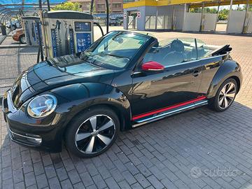 volkswagen new beetle cabrio red