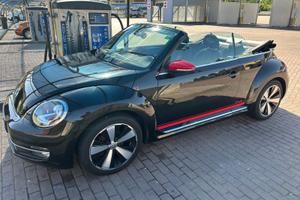 volkswagen new beetle cabrio red