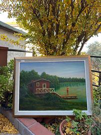 Casa su lago con bagnante sul pontile