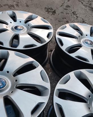 4 cechi in ferro Ford 16" compreso di copricerchi 