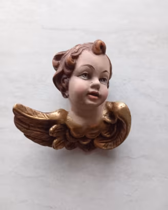 Testina di angelo da parete