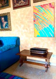 Quadro astratto azzurro e arancione