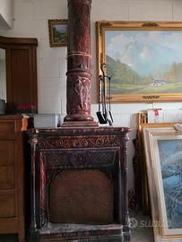 Stufa d’epoca con canna fumaria stile liberty