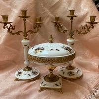 Tris candelabri e alzata