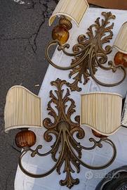 Coppia di applique in ottone a due luci