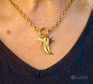 Collana in acciaio inoss. con corno e pendenti