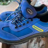 Scarpe e casco Postə Italianə