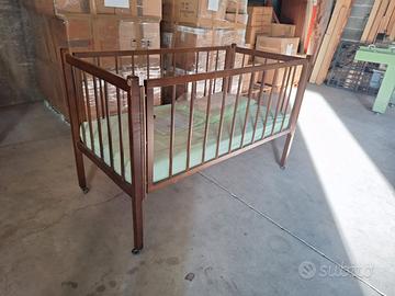Lettino con sbarre e materasso