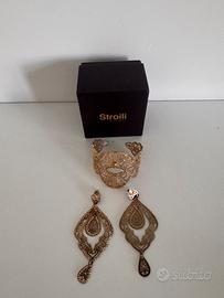 Bracciale e orecchini stroili oro