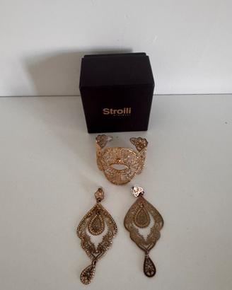 Bracciale e orecchini stroili oro