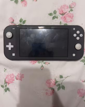 Lotto Nintento switch Lite grigia + 4 giochi Top