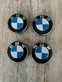 BMW - 4 Coprimozzi Ruota con bordo crom. ORIGINALE