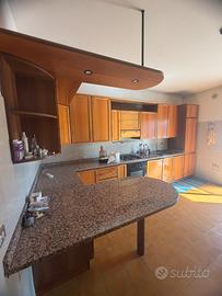 cucina a L con penisola