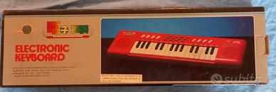 Pianola giocattolo vintage verde