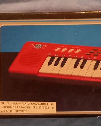 Pianola giocattolo vintage verde