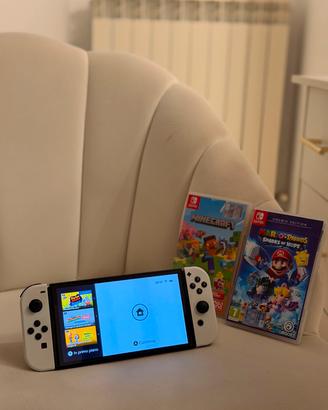 Nintendo Switch OLED + Minecraft e Mario Rabbids