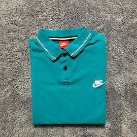 polo nike tuechese con logo bianco taglia L