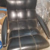 Poltrone in pelle di stilista italiano anni 60